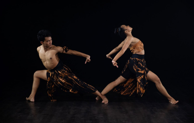 Moving spirit: A still image shows two dancers in 'The Surrender' by choreographer Chikal Mutiara Diar of Swargaloka, a studio that specializes in traditional dance.