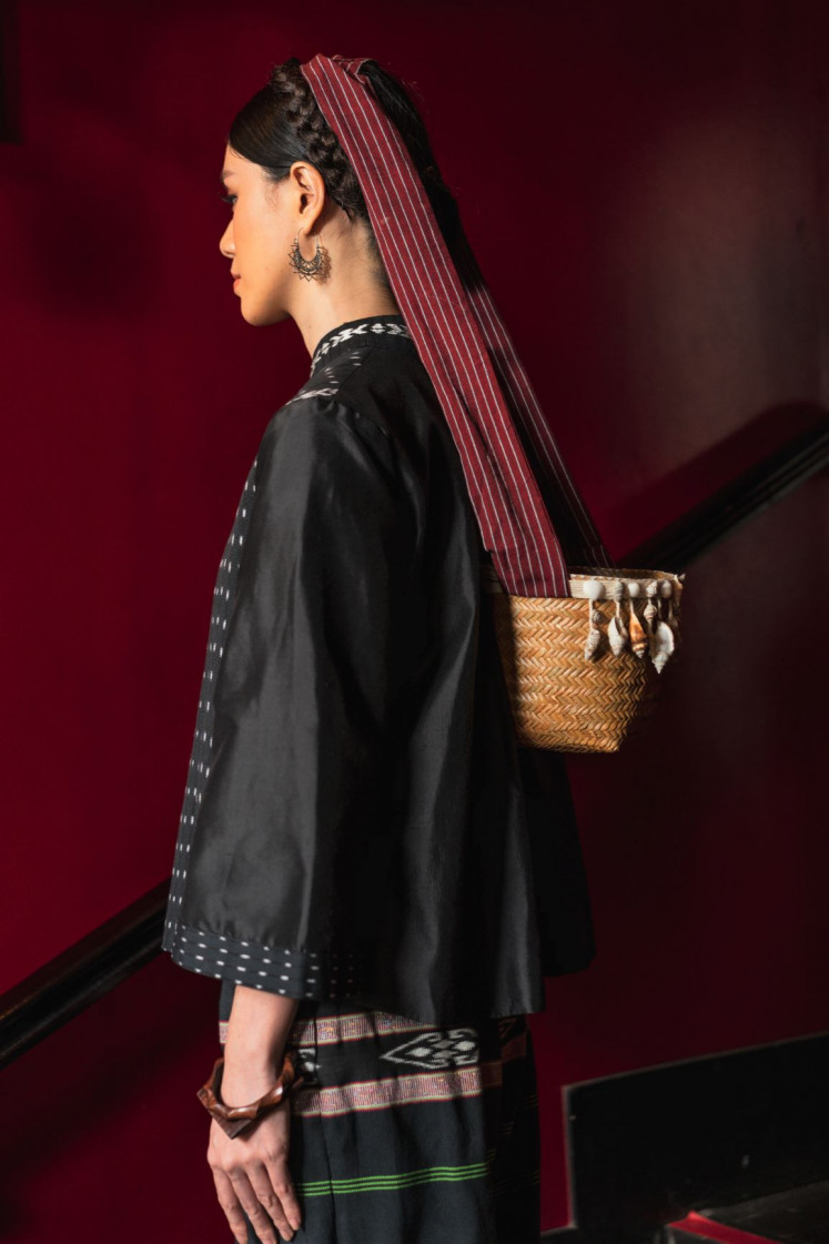 Weaving sustainability: The unique, indigenous culture of the Tanimbar people is preserved in the contemporary incarnation of couture brand IKAT Indonesia, including this woven pouch, which is traditionally draped around the head.