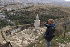Roi Porat, an archaeologist at the Hebrew University of Jerusalem and head of the Herodium excavation, speaks during an interview with AFP at King Herod's tomb site at the Herodium palace built by Herod the Great between 23-15 BCE in the Judaean desert, southeast of Bethlehem in the occupied West Bank, on December 7, 2020. 