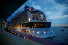 Royal Caribbean's Quantum of the Seas cruise ship is moored at Marina Bay Cruise Center after a passenger tested positive for coronavirus disease (COVID-19) during a cruise to nowhere, in Singapore, on December 9, 2020. 
