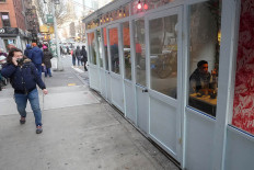 Congress nears US spending deal, Fed more upbeat on outlook