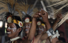 Gay indigenous men perform at the Nazareth Reservation community, near Leticia, Amazonas department, Colombia on November 20, 2020. 