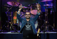 In this file photo taken on August 15, 2019 English musician Ringo Starr performs onstage at the 50th anniversary celebration of Woodstock at Bethel Woods Center for the Arts in Bethel, New York. 