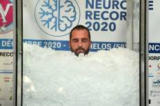 French 'Ice man' sets new world record in freezing glass cabin