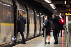 Train staff boards the last scheduled Eurostar train from London to Paris ahead of travel restrictions imposed by the French government on the UK, amid COVID-19 pandemic, in London, Britain on Sunday