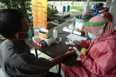 Central Java rations processing of swab samples due to labs' limited capacity