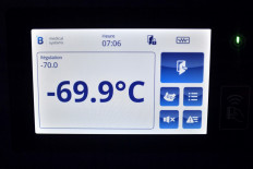 This picture taken on December 26, 2020, on the outskirts of Paris, shows the negative temperature of an ultra low temperature freezer at the arrival of the first shipment of boxes of Pfizer-BioNTech Covid-19 vaccines in the AP-HP central pharmacy before being transported to hospitals in Sevran and Dijon. - France's first doses of the Pfizer-BioNTech coronavirus vaccine were delivered early on December 26, 2020, to the Paris hospital system's central pharmacy outside the capital, an AFP journalist saw. A refrigerated truck brought the roughly 19,500 doses from the Pfizer factory in Puurs, northeast Belgium, to Paris, the capital's APHP hospital authority said, with pharmacy chief Franck Huet calling it a 