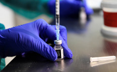 A healthcare worker fills a syringe with the Pfizer-BioNTech COVID-19 vaccine at the University Hospital, as the coronavirus disease (COVID-19) outbreak continues, in Nitra, Slovakia, December 26, 2020. 