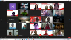 A screen displays participants in an online discussion aimed at supporting intellectually disabled people held by the Surabaya chapter of the Youth Club SoIna.