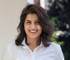 Saudi court jails women's rights activist, posing challenge for Biden