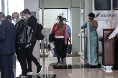 Ukraine passengers arrive at Mattala Rajapaksa International Airport, in Mattala on December 28, 2020. 