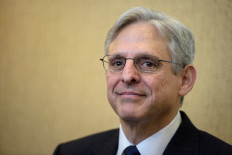 In this file photo taken on March 28, 2016, US Supreme Court nominee Judge Merrick Garland waits for a meeting with US Senator Benjamin Cardin on Capitol Hill in Washington, DC. President-elect Joe Biden has selected Garland as his attorney general, officials familiar with the selection process said on Wednesday,  Biden is expected to announce Garland's appointment on  Thursday.
