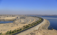 A general view shows Egypt's High Dam in Aswan, some 920 kilometres south of the capital Cairo, on January 3, 2021. Half a century since Egypt's Aswan dam was inaugurated to much fanfare, harnessing the Nile for hydropower and irrigation, the giant barrier is still criticised its human and environmental toll. But it is also a stark reminder -- amid high tensions today as Addis Ababa fills its collosal Grand Ethiopian Renaissance Dam (GERD) upstream, Africa's largest -- of just how volatile politics over the lifegiving but finite Nile water resources can be, academics say.