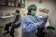 Jakarta aims for 75.2% coverage in 'massive' COVID-19 vaccination drive amid 2-week spike