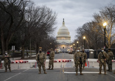 Members of the US National Guard stand watch at the US Capitol in Washington, DC on January 17, 2021, during a nationwide protest called by anti-government and far-right groups supporting then US president Donald Trump and his claim of electoral fraud in the November 3 presidential election. 