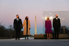 US President-elect Joe Biden, his wife Jill Biden, Vice President-elect Kamala Harris and her husband Doug Emhoff attend a coronavirus disease (COVID-19) memorial event at the Lincoln Memorial in Washington, US. January 19, 2021. 