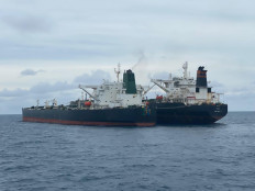 The Iranian flagged MT Horse and the Panamanian flagged MT Frea are seen anchored in the waters off Pontianak, West Kalimantan, on Jan. 24, 2021. The Maritime Security Agency (Bakamla) reportedly caught the two foreign tankers conducting an illegal ship-to-ship (STS) oil transfer in violation of Indonesia's right of transit passage.