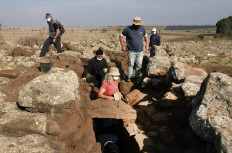 Israel Antiquities Authority (IAA) archeologists work at a fortified complex from the time of King David which was exposed for the first time in archaeological excavations carried out by IAA in the Hispin settlement in the Israeli-annexed Golan Heights on November 11, 2020. Israeli archaeologists unveiled Wednesday a fortified structure in the Israeli-occupied Golan Heights from the time of King David, which sheds light on the borders and size of an ancient kingdom. The 3000-year-old fort, found near the southern Golan community Hispin ahead of works to build a new neighbourhood, is believed to have belonged to the Geshurites, allies of the Israelite king.