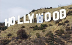 Vandals have altered the landmark Hollywood sign to read "Hollyboob" on Feb. 2, 2021. Police in Los Angeles have arrested six suspects.