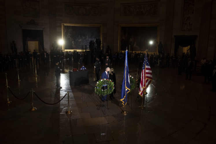 President Joe Biden and first lady Dr. Jill Biden pay their respects to US Capitol officer Brian D. Sicknick as he lies in honor in the US Capitol on February 2, 2021 in Washington, DC. Officer Sicknick died as a result of injuries he sustained during the January 6 attack on the U.S. Capitol. He will lie in honor until February 3 and then be buried at Arlington National Cemetery. 