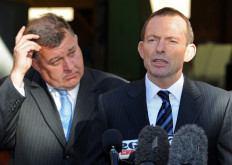 Australia's former prime minister Tony Abbott (right) campaigns with Craig Kelly (left), Liberal candidate for the marginal seat of Hughes, in Sydney on August 16, 2010. Australian Prime Minister Julia Gillard on August 16 made a Barack Obama-style 