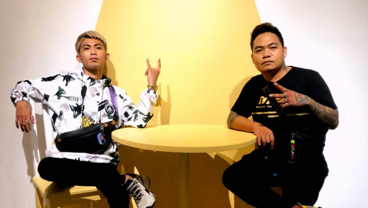 Jonathan Dorongpangalo (right) and Everly Salikara, the singer-rapper duo behind the viral song 