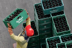  Japan's Kirin cuts ties with Myanmar military-owned firm over coup 