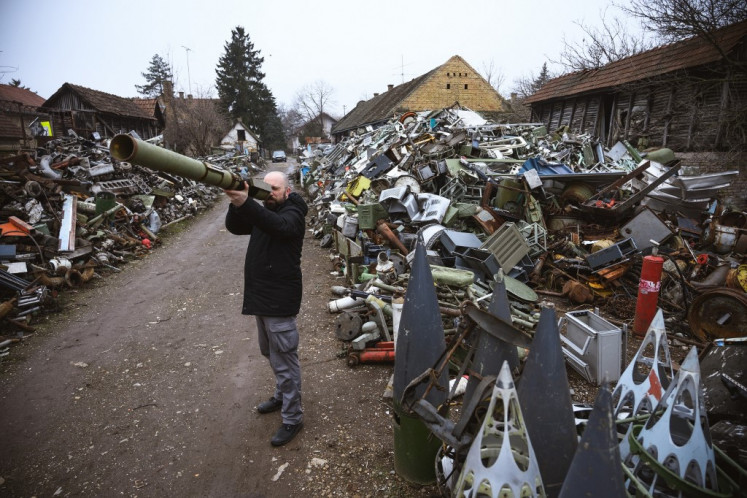 Serbian sculptor Nikola Macura browses through a military scrapyard, searching for weapons he could use as instruments. Macura, 42, is trying to transform these former forces of destruction into vessels of creation in a region that still bears the scars from the 1990s wars that unravelled Yugoslavia