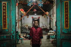 Lim Kiem Hau, also known as Gepeng, is a third-generation resident of Tambak Bayan.
