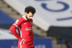 Liverpool's Egyptian midfielder Mohamed Salah reacts during the English Premier League football match between Leicester City and Liverpool at King Power Stadium in Leicester, central England on February 13, 2021.
