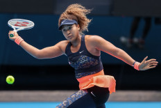  Osaka saves match points against Muguruza to reach Open quarters 
