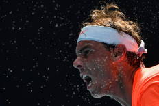 Nadal crushes fiery Fognini to reach quarter-finals