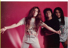 Irvan Sembiring (left), the lead guitarist of the thrash band Rotor, poses for a photo with drummer Abu Bakar Bufthaim (center) and bass player Yudha Pranyoto.