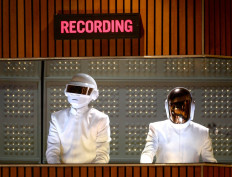 French musicians Thomas Bangalter (L) and Guy-Manuel de Homem-Christo of Daft Punk perform onstage during the 56th GRAMMY Awards at Staples Center in Los Angeles, California. The duo have announced their split via a new video, a spokesperson confirmed on February 22, 2021