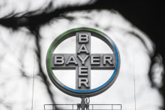 A picture taken on February 23, 2021 shows the logo of German chemicals and pharmaceuticals giant Bayer at the group's plant in Wuppertal, western Germany. Bayer AG will hold its annual press conference with the annual results in Leverkusen as a virtual event on February 25, 2021.