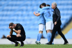  Manchester City stride clear, Brighton pay the penalty amid refereeing chaos 