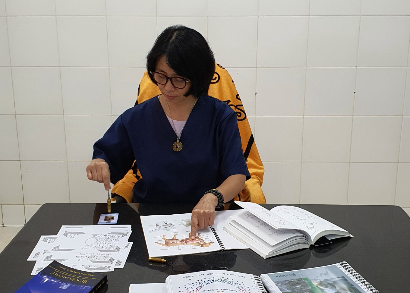 Anggie supposedly communicating with an animal.