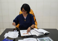 Anggie supposedly communicating with an animal.