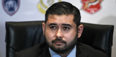 In this file photo taken on March 25, 2017, newly appointed President for the Football Association of Malaysia (FAM) Tunku Ismail Sultan Ibrahim listens to questions from a journalist during a press conference before the FAM annual congress meeting in Kuala Lumpur.  (Agence France Presse/Mohd Rasfan).
Usage: 0