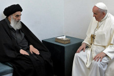 A handout picture provided by the Vatican media office shows Pope Francis meeting top Shiite cleric Grand Ayatollah Ali al-Sistani, in the Iraqi shine city of Najaf, on March 6.