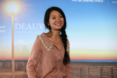 In this file photo taken on September 5, 2015 US-Chinese director Chloe Zhao poses during a photocall to present the movie 