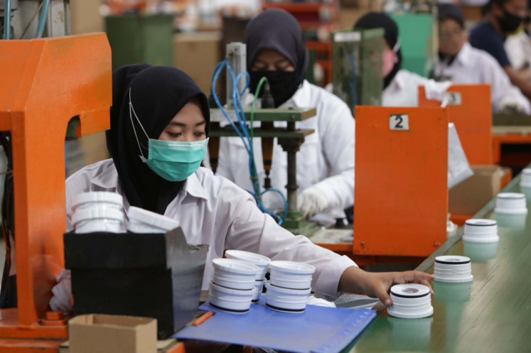 Women factory workers are pictured in an undated photo.