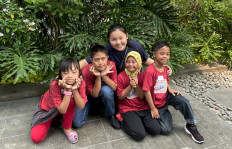 Carys with some of the Carys Cares children.