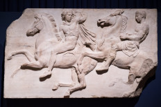 A section of marble frieze sculpture (438-432 BC) from the Parthenon in Athens, part of the collection that is popularly referred to as the Elgin Marbles, is displayed during a press preview of the British Museum's 