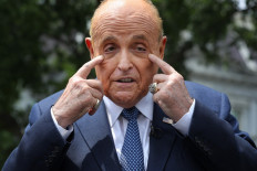 President Donald Trump's lawyer and former New York City Mayor Rudy Giuliani talks to journalists outside the White House West Wing July 01, 2020 in Washington, DC. 