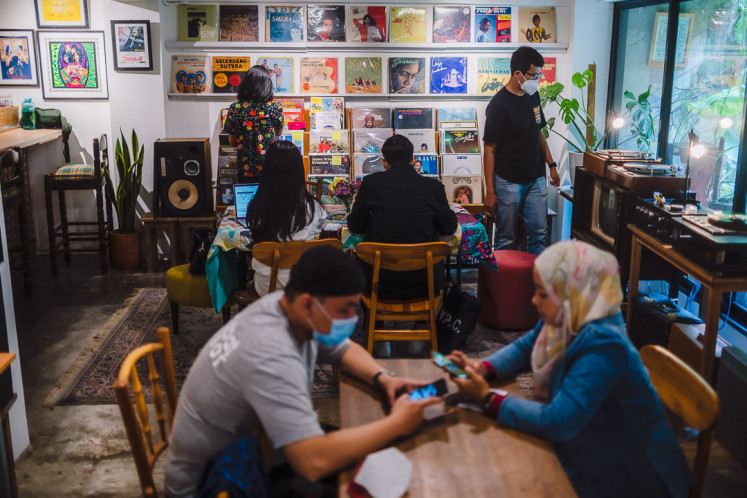 Visitors can relax while browsing through SUBO's collection of vintage records.