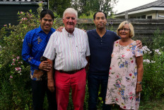 Bud Wichers (left) poses with his parents and brother Rik. The couple adopted Bud in Jakarta and Rik in Surabaya, East Java. 