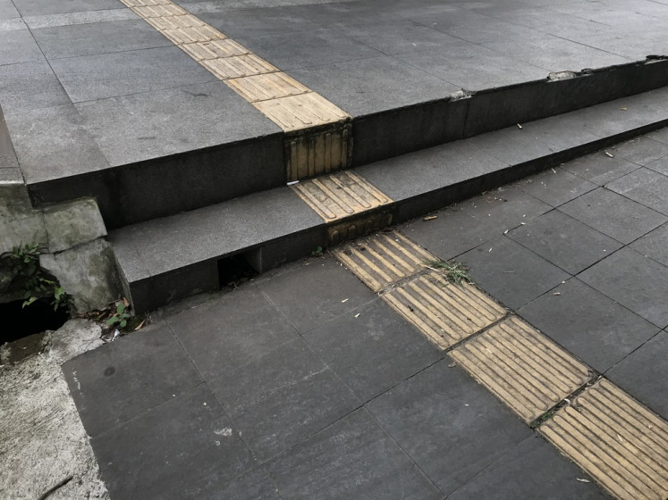 Without warning: Tactile pavements installed with no blistered blocks to warn visually-impaired people