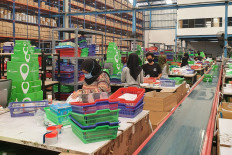 Thoroughly organized: Tokopedia's fulfillment service TokoCabang allows businesses to expand their reach through benefits like dedicated storage, round-the-clock customer service and comprehensive package data.