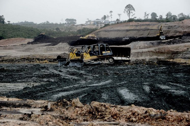 This photo taken on May 19, 2017 shows an open pit coal mine in Jambi.